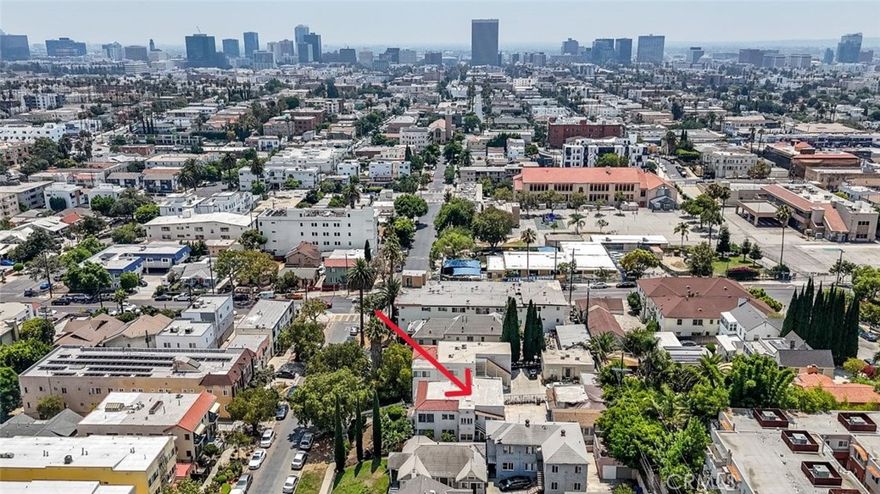 Ideal opportunity to develop a new multi-unit project in close proximity to Downtown Los Angeles, Hancock Park, Silver Lake, Koreatown, and East Hollywood. The property is located within a Qualified Opportunity Zone (QOZ), offering potential tax benefits for qualified investors (buyer to verify). Currently improved with three vacant units, providing immediate flexibility for redevelopment or repositioning. The site offers potential for a 9-unit residential project, subject to buyer verification and city approvals. The City of Los Angeles provides numerous housing and density incentive programs that may allow optimization of unit count and overall project feasibility. Centrally located near major transportation routes, employment centers, shopping, dining, and public amenities. Utilities are available in the street. An excellent opportunity for developers or investors seeking a well-located property in a high-demand rental market. Buyer to verify zoning, incentives, development feasibility, and QOZ status.
