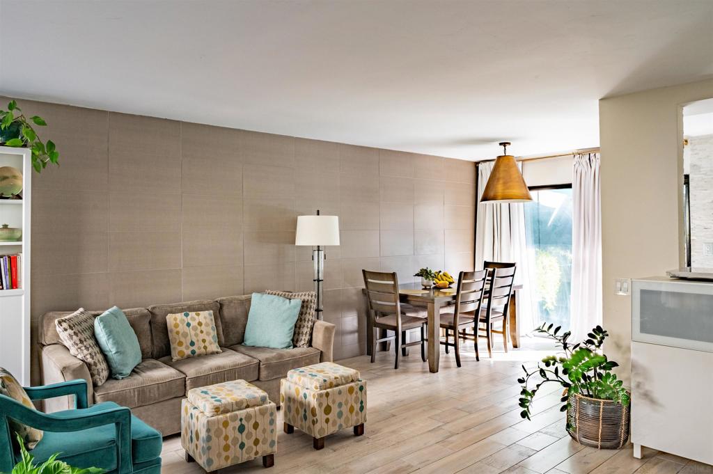 Welcome to your stay in San Diego! The rental period offered is a fixed term for min of 30 days from December 20, 2025 - January 20, 2026 OR June 1, 2026 - August 15, 2026. Enjoy al-fresco dining, or lounging on the patio, complete with plush patio furniture and beautiful plants. Sip your morning coffee and have breakfast at the outdoor marble table under a turquoise umbrella on the patio with a few culinary herbs and container fruit trees. As you step inside, you'll be greeted by an open and spacious living area with plenty of natural light. The updated kitchen features stainless steel appliances, including dishwasher, white cabinets, gray countertops, and plenty of storage space with additional pantries. The open kitchen leads seamlessly into the dining room, living room, and patio for a great flow! There are two bedrooms, one is a spacious primary with high ceilings, an ensuite bathroom, and two balconies, and the second room is cozy with a luxury sofa bed with upgraded, stylish, and comfortable foam mattress. Gucci Tiger wallpaper imported from Italy adds a creative flare. The guest bathroom is updated with wood detailing and modern touches, such as a wide contemporary white sink and stylish wood vanity. Two stylish desks are conveniently located on both levels for a comfortable work from home option. Other features of this stunning townhome include laundry as well as stylish lights for ambiance. Located in a beautifully landscaped complex complete with pool, hot tub, sauna, and tennis courts. Minutes from USD, centrally located, close to San Diego destinations! The complex is beautifully landscaped and very quiet. You can hear the birds singing in the morning and throughout the day. The neighbors are friendly and it is a lovely community where you can take long walks and exercise outdoors if you like to be active. There is FREE parking on North Rim Court in the complex by the tennis courts, a few minutes walk to the townhome, or you can choose to pay for a parking permit to park anywhere in the complex and closer to the unit. Parking permits are subject to availability for a cost of $40 per month. Included: High speed internet, Netflix, Home Sonos music system. There will be a required professional exit cleaning fee, however professional housekeeping is included once per month at no additional cost to you.