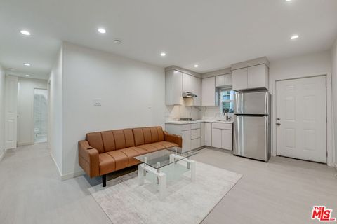Photo of 8710 N Chalmers Street, Los Angeles, CA 90035 (MLS # 25629813)