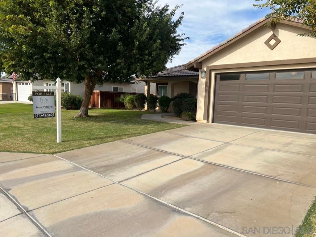 Photo of 231 Bell Ct Ct, Brawley, CA 92227 (MLS # 2600947SD)