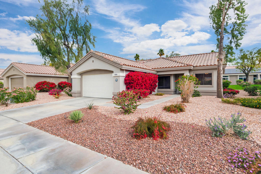 Welcome to a beautifully renovated 2-bedroom, 2-bath home in Sun City Palm Desert, an active 55+ community designed for vibrant, healthy living. This open-designed Limoges model offers the privacy of a house with the carefree feel of a condo. The kitchen boasts quartz countertops and new stainless steel LG appliances. Both bathrooms feature quartz countertops and modern fixtures. New luxury vinyl flooring, baseboards, interior paint, window coverings, and new LG washer and dryer complete the upgrades. The spacious primary bedroom includes an en-suite bath with an enclosed shower and tub, plus a walk-in closet. The second bedroom can serve as a guest room or office. The guest bath offers an oversized walk-in shower. Located near scenic greenbelts, walking trails, and two golf cart gates providing easy access to shopping, this home supports an active lifestyle. Community amenities include pools, fitness centers, golf courses, tennis courts, and a busy social calendar with clubs and events. HOA dues cover exterior maintenance, roof repair, gardening, premium cable TV, and high-speed internet, offering low-maintenance living.Don't miss this rare chance to live affordably in Palm Desert's most sought-after active adult community. Schedule your private tour today and start enjoying the active, carefree lifestyle you deserve!