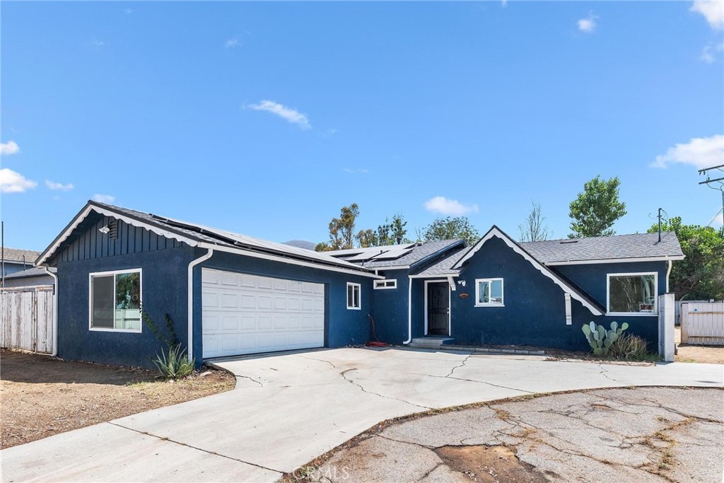 Welcome to your dream home in the heart of Horse Town USA, Norco, California! This beautifully updated 3-bedroom, 2-bathroom residence is perfect for those who love both comfort and the equestrian lifestyle. Featuring new floors, fresh paint, and a brand-new dishwasher, this home is move-in ready. The roof was completely redone in 2022, offering peace of mind for years to come, and you'll also enjoy the energy efficiency of paid-off solar panels. The home boasts some new dual-pane windows that not only improve energy efficiency, but also enhance the overall aesthetics of the property. RV access on the side of the house and double gate in the backyard that allows for you to pull in your trailer. Perfect for horse lovers, the area is known for its extensive horse trails that are available for residents to enjoy. Whether you’re a seasoned equestrian or just enjoy the rural charm, you'll appreciate the unique connection this neighborhood offers to the outdoors. While the area has a quaint, small-town feel, it’s also conveniently located close to major freeways and local amenities. This home provides the perfect blend of peaceful country living with easy access to everything you need. Don't miss out on this rare opportunity to live in one of California’s most beloved horse communities!