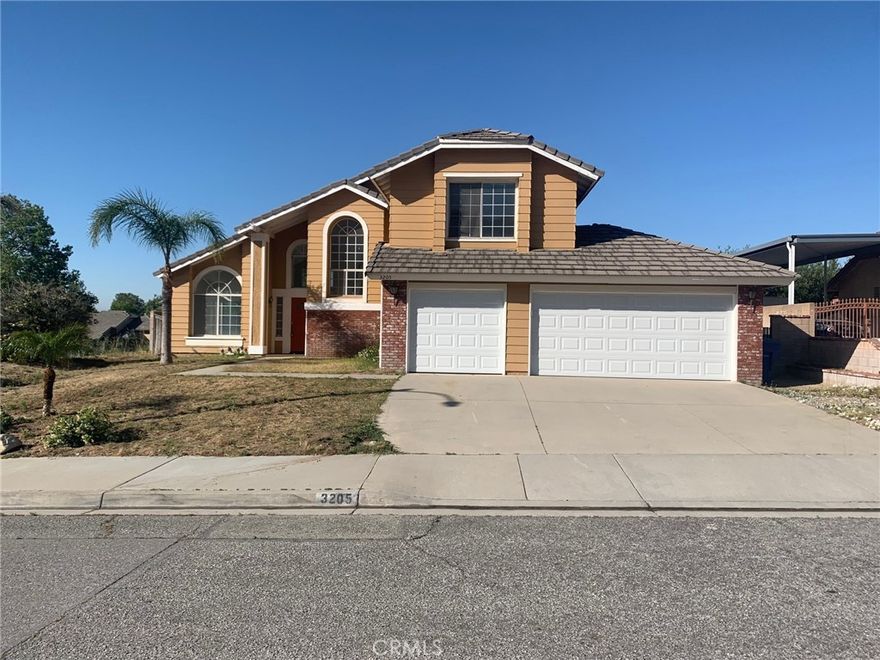 Come check out this beautiful home located in North San Bernardino off Palm Ave. The house has been repainted and carpets shampooed. New garage doors have been installed on the 3 car garage. The home features 4 bedrooms and 3 bathrooms. One bedroom and one full bathroom are located downstairs. Come check it out, this will not last!