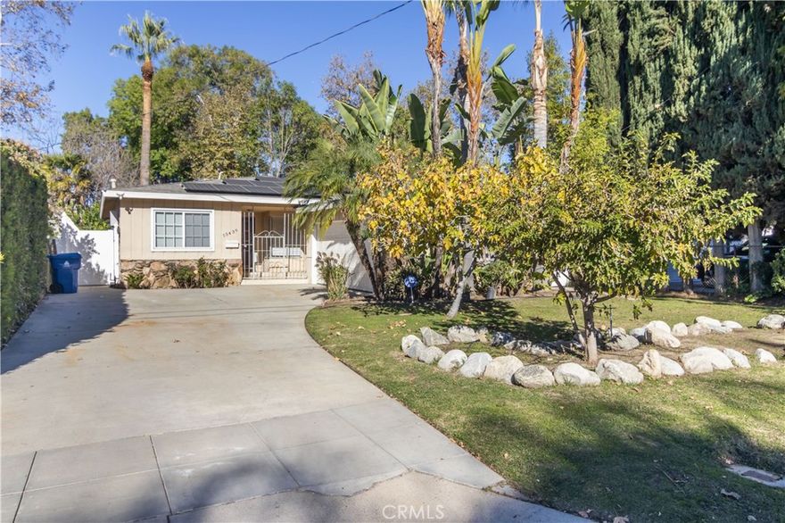 This beautifully updated 3 bed, 3 bath pool home in Van Nuys is located on a quiet street and offers a perfect blend of comfort and convenience. The house features a completely remodeled kitchen and bathrooms, new flooring throughout, and comes equipped with a washer and dryer. Enjoy a fenced private pool, fruit trees in the yard, and a two-car garage for ample parking and storage. Solar panels help significantly reduce electrical costs, and the home is conveniently close to major freeways, making commuting a breeze. This inviting property is move-in ready and ideal for those seeking modern living in a great location.