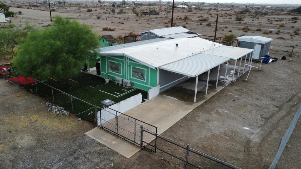 Welcome to this well-maintained manufactured home on a permanent foundation, offering plenty of potential! Inside, you'll find 2 bedrooms (including a bonus room) and 2 bathrooms, with the second bathroom featuring a convenient Jack-and-Jill design that connects directly to the kitchen area for added accessibility.The property includes a detached garage and a storage unit, offering ample space for tools, hobbies, or personal belongings. The low-maintenance yard features artificial turf for easy upkeep, along with a designated play area.Recent repairs and upgrades add to the home's appeal, making this a fantastic opportunity for buyers seeking both value and functionality.Financing options available! Don't miss out on this property and everything it has to offer!Yo hablo espanol!