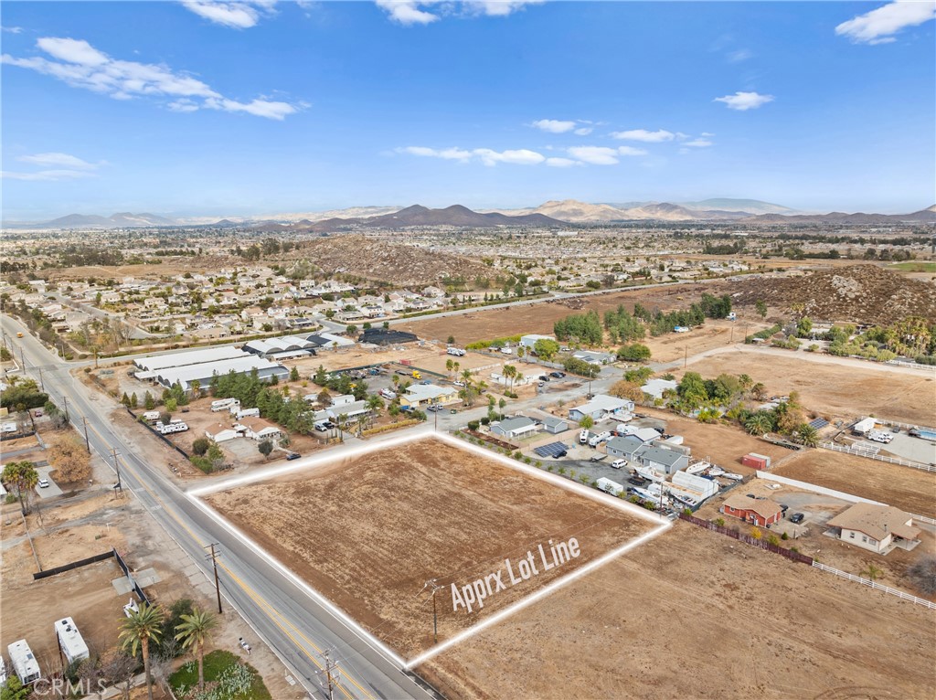 Build your dream home on this desirable property located in one of Menifee's fastest growing neighborhoods! This expansive 1.63-acre lot offers a rare opportunity to build your ideal home in the heart of Menifee. The flat, usable land provides the perfect foundation for a custom-designed residence, whether you're a homebuilder, developer, or looking to craft your own private estate. With ample space for a variety of building possibilities, the property gives you the freedom to bring your vision to life. Situated in a prime location, you’ll enjoy the convenience of nearby schools, shopping, dining, and parks, while still maintaining the peace and privacy of your own expansive lot. Public utilities, including electricity and water, are easily accessible. Whether you're looking to invest or create your forever home, this property offers endless potential. Don’t miss out on this exceptional opportunity!