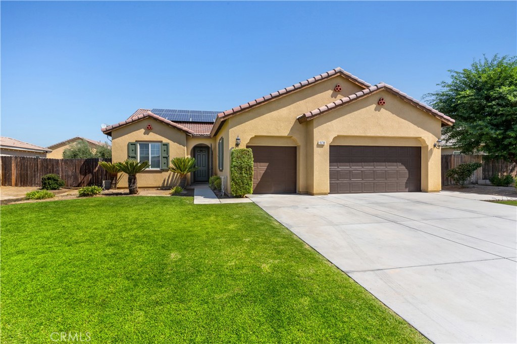 Opportunity knocks with this beautiful 4 bedroom 2 bath home located in Saddleback at Tallus Ranch. This beautiful home features formal living and dining plus a large family room, a large kitchen that is a chefs delight with stainless appliances, Granite counter tops, a large island with plenty of room for prep and making memories, tons of storage and pendant lighting. The family room has plenty of room for entertaining and built in shelving. The bedrooms are nice and large with ceiling fans and shutters to keep the hot summer sun out. The main suite features a ceiling fan, plantation shutters and a large private bath with separate tub and shower, quartz counter top and dual sinks. The back yard is a nice size with a covered patio and plenty of room for entertaining and plenty of room for a pool. All of this and it includes a large three car garage and owned solar to cover the power bills. Schedule your showing before this one is gone.