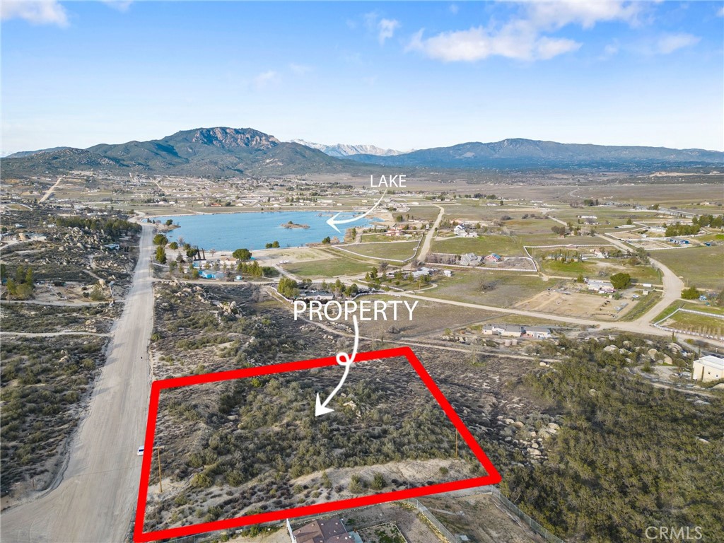 Don’t miss this incredible opportunity to own a 2.66-acre lot in the desirable gated community of Lake Riverside Estates in Aguanga. This parcel offers breathtaking panoramic views of surrounding hills, mountains, and the lake. Ideally located just minutes from the main gate and within close proximity to the community lake and amenities.
This scenic lot is the perfect place to build your custom dream home and enjoy peaceful country living with year-round natural beauty, including snowcapped mountain views in winter and stunning sunrises and sunsets.
Lake Riverside Estates features a wide range of amenities including a private airstrip, community pool, equestrian trails, playground, picnic areas, and a 55-acre lake for fishing and non-motorized boating. Outdoor enthusiasts will enjoy biking, hiking, horseback riding, and the serene surroundings. All this just a short drive to Temecula’s renowned wine country.