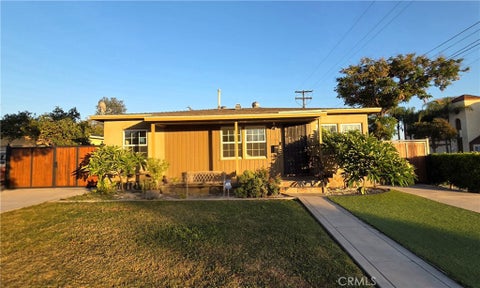 Photo of 13287 Helmer Drive, Whittier, CA 90602 (MLS # DW26200520)