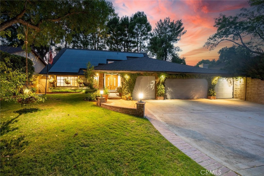 Never before on the market is this "one of a kind" pool home in the original Valencia neighborhood, Old Orchard! Over the years this amazing property has been expanded and modified to really take advantage of this private, special location. A previous owner had expanded the yard another 15 feet and done some crazy fun things including a true cabana with its own AC that can easily accommodate a game night for 20! Walk-up observation deck off the back to view the pool, spa, huge garden shed and gorgeous flagstone hardscape. Also, because it backs to the open space, exceptional privacy. You won’t find another yard like this! The original floorplan that had 4 bedrooms up and one down has been changed and includes a large bump out for the kitchen (much more usable space) and a huge gym off the family room. The 5th bedroom down now opens up a huge family room, twice the size of the previous. Even the 3-car garage had a 4th car storage/second laundry room added. The solar was installed in 2020 (covering most of the energy usage) and the roof was redone at that time. Many upgrades throughout including a remodeled kitchen with high end Viking appliances, crown molding, wood & tile floors, newer windows & sliders, remodeled bath and sharp paint. The home measures over 2,900 sqft and feels every bit of it. Close to Old Orchard Park, schools, restaurants and shopping and minutes off the freeway for commuters. Low HOA with all the great Valencia amenities and no Mello Roos taxes. No other home like this probably exists in Valencia!