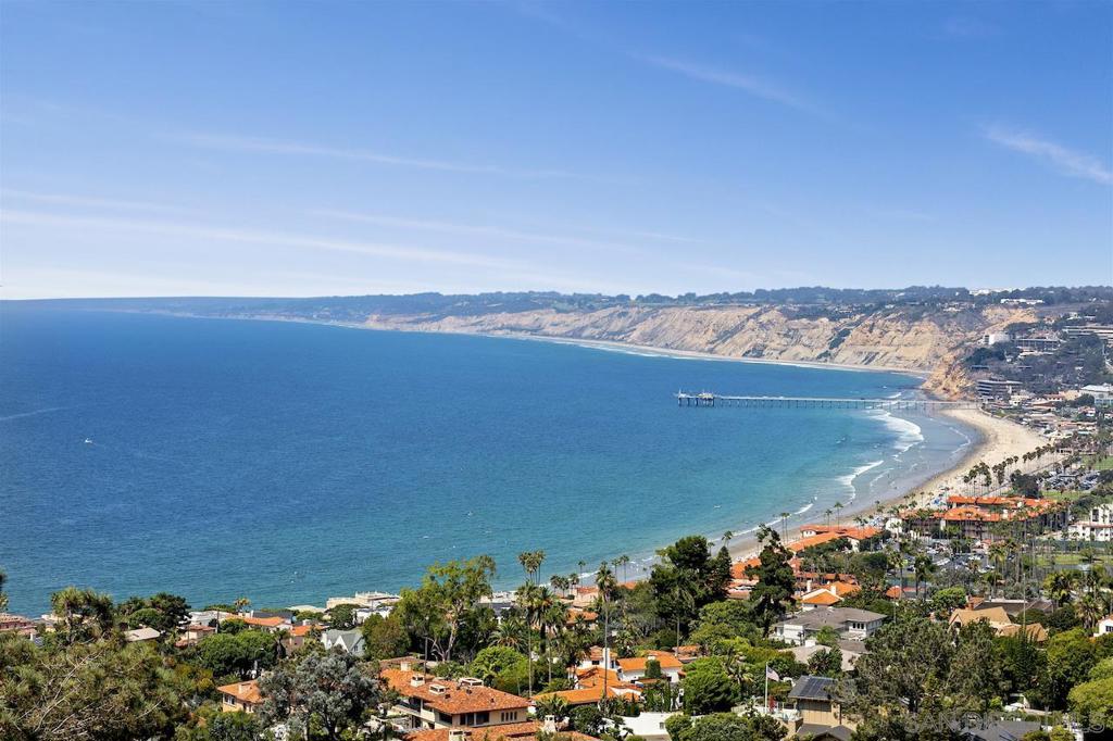 WORLD CLASS VIEWS. There is nothing subtle about this view. It is bold, vibrant, majestic. This impressive hillside estate is singular in its beauty. With towering ceilings, soaring walls of glass, and splendid public and private rooms, it offers grace and comfort. All bedrooms are en suite and include two stately masters complete with living rooms, lavish baths, and ocean-view showers. Gorgeous library/office; gym; restaurant-style bar; elevator; solar and smart home systems, too. Outdoor living is delicious with extensive decking, huge living areas, outdoor kitchen, and the resort-style pool. Offers peaceful seclusion and the best views imaginable. In 2020 the home was upgraded to a smart system which includes the Lutron lighting system. Through the use of an App one can control the lights, televisions, the air and heat system (4 zones); pool and spa, and the garage doors. There are two master bedrooms each with heated floors in the master bathrooms. There is a whole house solar system. The home has beautiful Italian Limestone and Brazilian Cherry wood floors and the kitchen is equipped with high end appliances. Equipment: Dryer,Pool/Spa/Equipment Sewer: Sewer Connected, Public Sewer Topography: SSLP