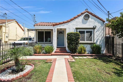 Photo of 833 W 98th ST, Los Angeles, CA 90044 (MLS # SR26126318)
