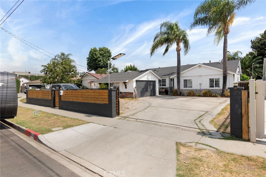 Tucked away on a quiet cul-de-sac, this spacious pool home blends charm and comfort. The original hardwood floors bring a timeless feel, and the inviting layout offers plenty of space to relax or gather with family and friends.
With three bathrooms and thoughtful details throughout, the home is designed to fit both everyday living and special occasions.
The backyard is the true highlight. A pool, covered patio, mature fruit trees, and multiple seating areas create the perfect setting for entertaining or unwinding.