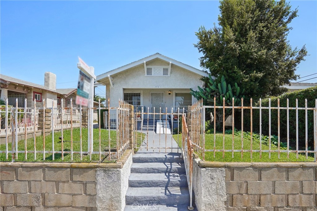 Investor-Friendly Craftsman in Prime South LA – Leimert Park Adjacent
Welcome to 3970 Dalton Avenue, a classic 1911 Craftsman-style home offering untapped potential in one of South LA’s most revitalized and transit-connected neighborhoods. Located just minutes from Leimert Park, USC, Exposition Park, and the Metro K Line, this property is ideal for buyers seeking value, opportunity, and location. Featuring 2 bedrooms and 2 bathrooms with a bonus room offering flexible space for a home office, guest room, or creative use across 1,062 sq. ft. of living space. The home sits on a 5,200 sq. ft. R2-zoned lot—offering room to expand or possibly add an ADU. With a little TLC and modern upgrades, this property could easily be transformed into a charming residence or income-producing investment. The traditional layout, spacious backyard, and early 20th-century architectural details make it an excellent canvas for your vision. Whether you're a homeowner ready to restore a piece of LA history or an investor looking for your next project, Dalton Avenue is priced to sell and primed with upside. Don’t miss this chance to own in one of LA’s most promising corridors—schedule your showing today!