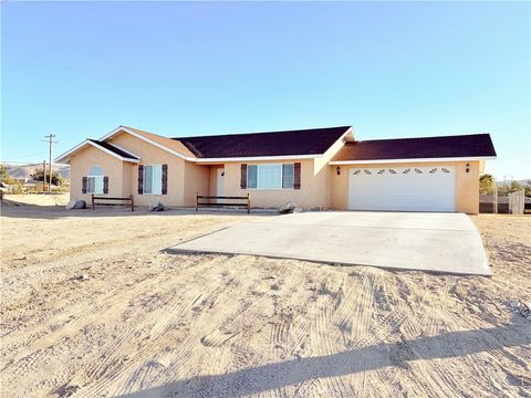 Photo of 74541 Sunrise Drive, 29 Palms, CA 92277 (MLS # JT25271538)