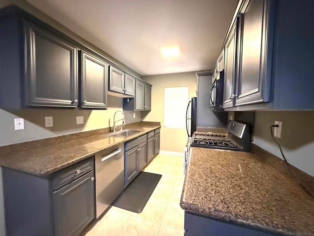 Photo of 5511 Adelaide Ave Ave #21, San Diego, CA 92115 (MLS # 260007316SD)