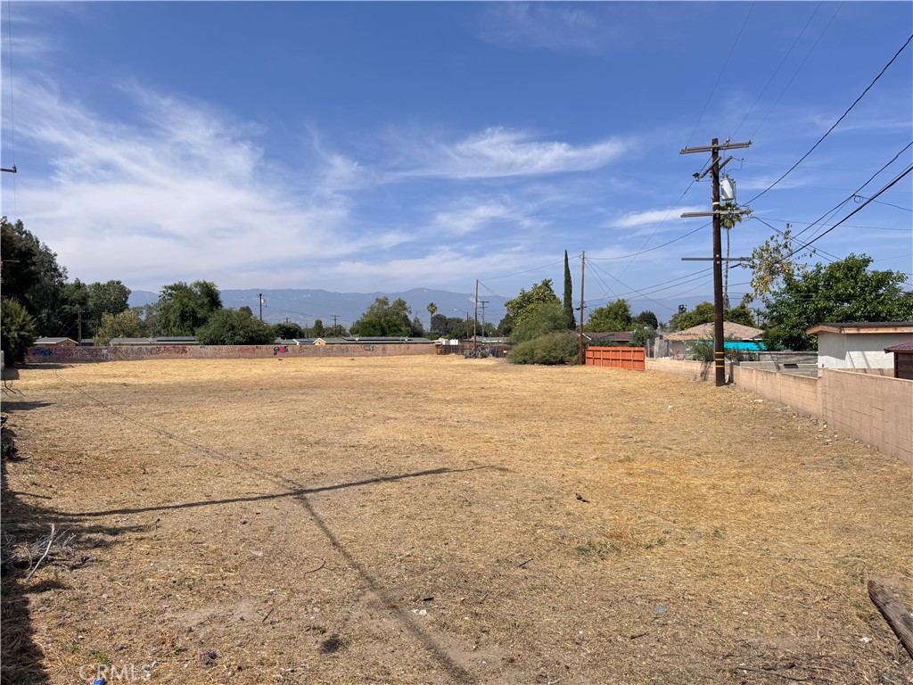 UNIQUE RESIDENTIAL LAND IN THE WEST SIDE OF SAN BERNARDINO. ZONING ALLOWS UP TO 4.5 SFR PER ACRE. WANT TO BUILD YOUR OWN PARADISE? OVER THREE QUARTERS OF AN ACRE. NO OTHER LOTS THIS SIZE IN THE AREA! Flat infill parcel ready for your plans to build that overside estate, with plenty of space for a pool, an ADU, a casita? It may be a mini subdivision, with two-three or four SFRs? Call city planning and submit your plans and do your own due diligence before submitting an offer. The lot is fully fenced and surrounded other homes. All utilities available on the street.