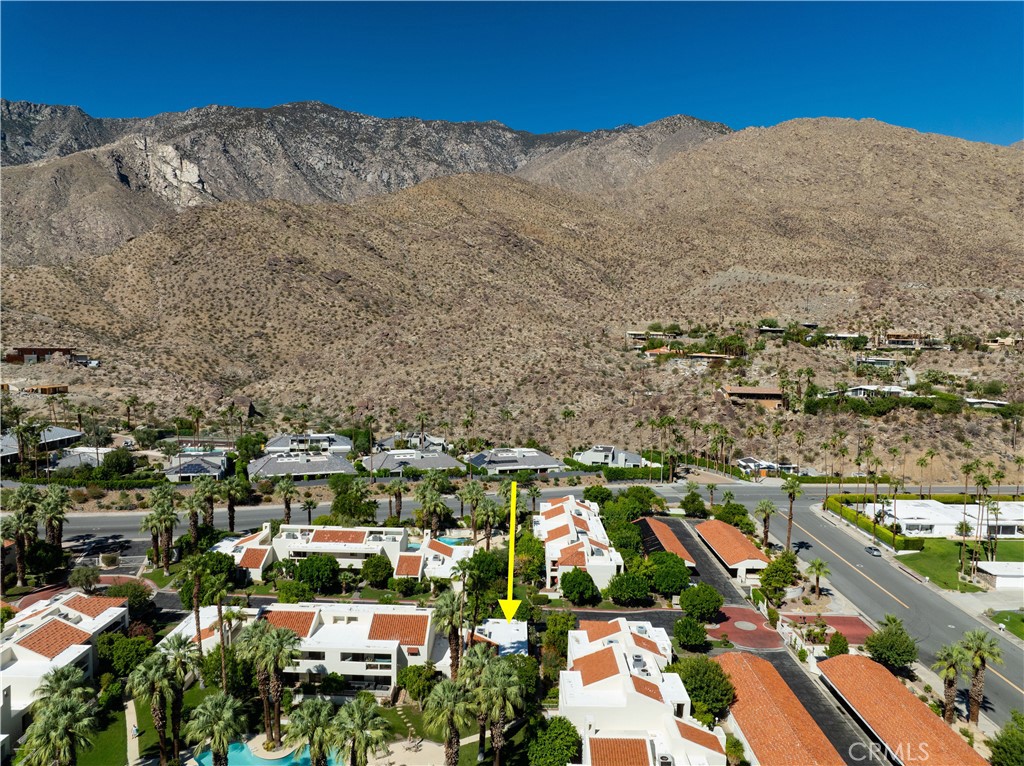 Unique condo nestled in the highly sought-after South Palm Canyon area of Palm Springs, this beautifully maintained single-story condo offers the perfect blend of comfort, convenience, and resort-style living. Just a short walk to the stunning Indian Canyons hiking trails, this 2-bedroom, 2-bath home is ideal for outdoor enthusiasts and those seeking a serene lifestyle. Inside, enjoy a spacious, light-filled layout featuring a cozy fireplace, ideal for cool desert evenings. Step outside to not one, but three private patios — two smaller patios offer quiet spots for morning coffee, while the main patio opens directly to the community pool and spa, making it easy to take a dip or relax in the sun anytime.
Additional highlights include:
-Single-level living for easy access
-Generously sized bedrooms
-Clerestory windows
-5 Sliding doors for easy access to patios
-In-unit laundry and plenty of storage
-Attached 1 car garage and beautifully landscaped grounds
Whether you're looking for a full-time residence, a vacation retreat, or a smart investment, this condo offers the best of Palm Springs living in a premier location.