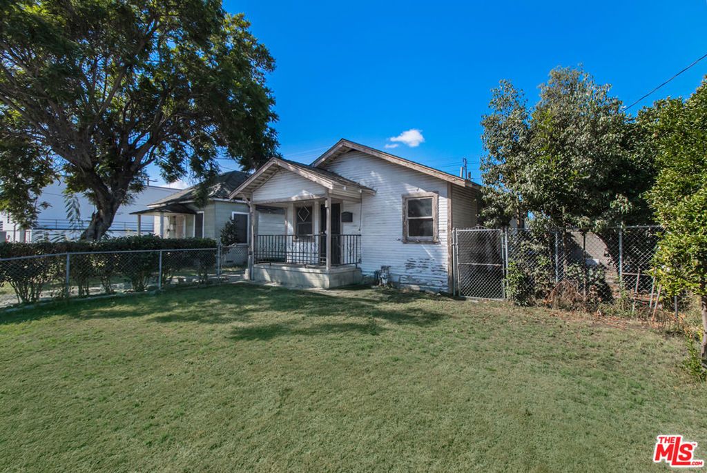 Photo of 6535 Regent Street, Huntington Park, CA 90255 (MLS # 25607803)