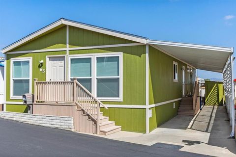 Photo of 65 Hummingbird Lane Ln, Oceanside, CA 92057 (MLS # NDP2603744)