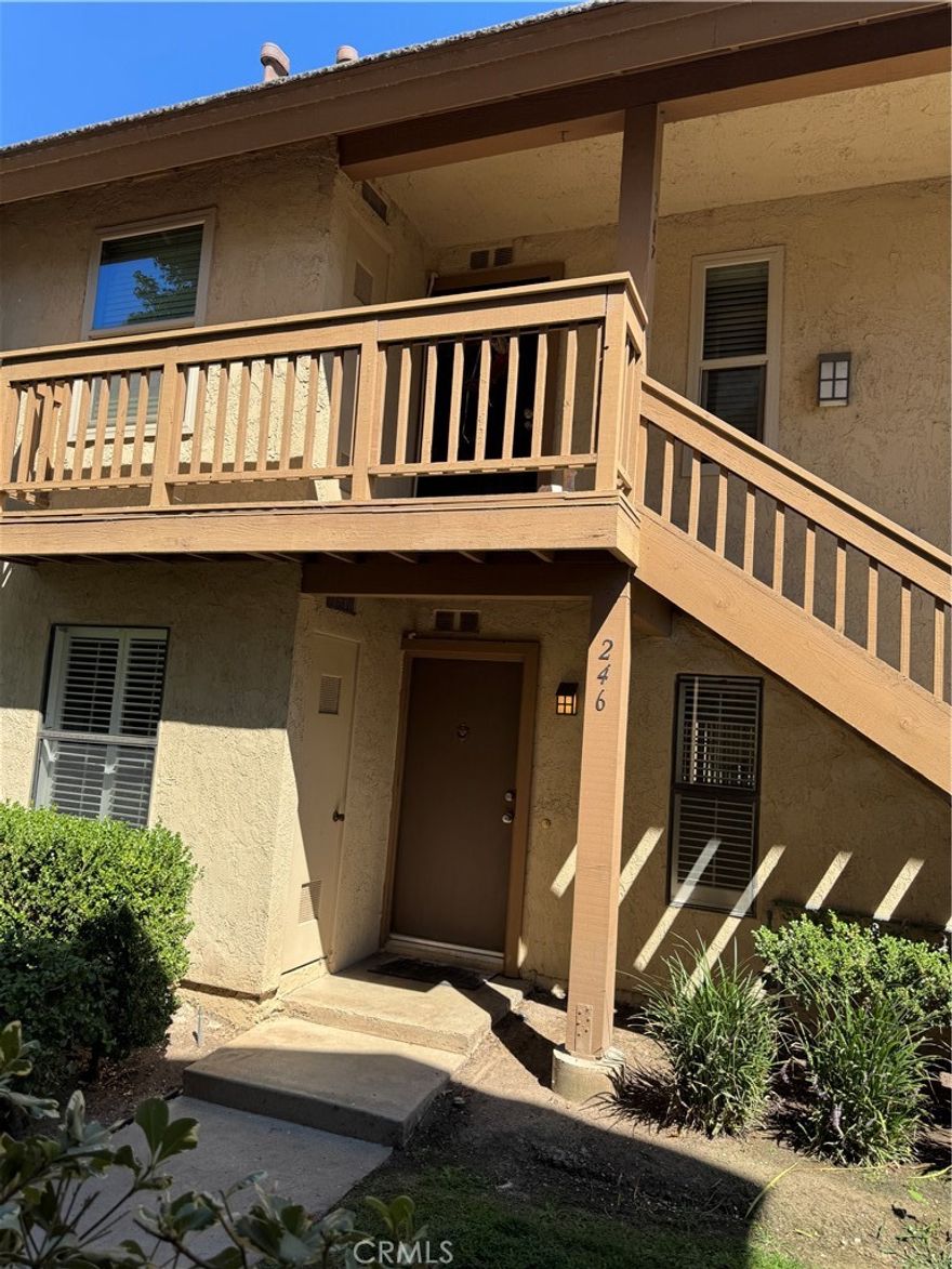 Beautiful Interior lower end level unit, stream view patio, pavel tile floor, 1 bedroom, 1 bath and I carport parking. Laundry hookup is in kitchen. Great location with award wining school.