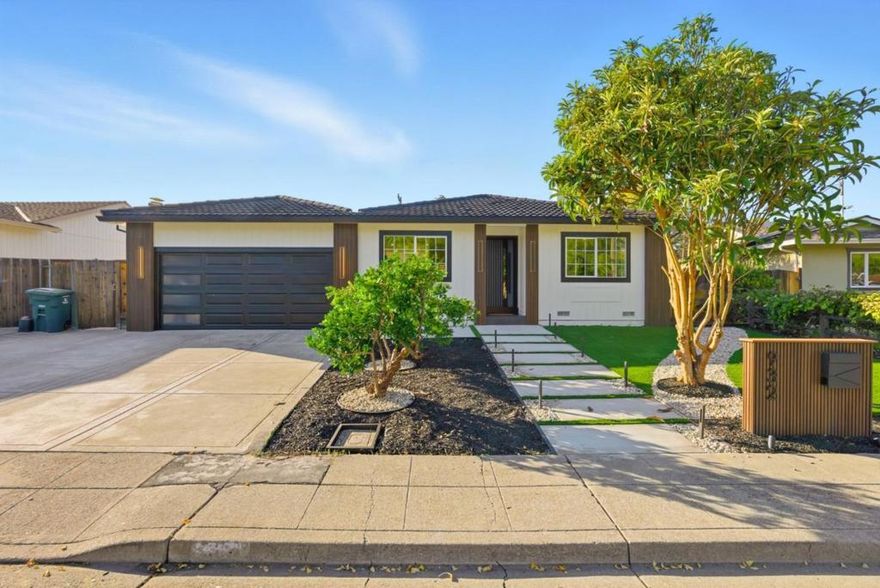 Halloween Special Open House on 10/31, 5-7 PM. Step through the beautifully landscaped front yard into this elegantly remodeled 4-bed, 2.5-bath home that perfectly blends modern design with everyday comfort. The entry opens to a bright, airy space illuminated by recessed lighting and centered around the warm glow of an electric fireplace, a perfect spot to unwind. At the heart of the home is a stunning kitchen, thoughtfully designed with quartz countertops, a matching backsplash, soft-close cabinetry, new stainless steel appliances, a built-in wine cooler, and a dedicated bar area, ideal for everyday cooking or effortless entertaining. Designer bathrooms feature LED mirrors and upscale finishes, adding a touch of luxury to your daily routine. Step outside to a spacious backyard retreat made for gatherings or quiet relaxation. Host summer barbecues under the gazebo, enjoy cozy nights by the firepit, or spend sunny afternoons on the swing set. A veggie garden and mature fruit trees complete this inviting space with natural shade for warm summer days. Located near top-rated schools, scenic parks, Mountain View amenities, and major highways, this home offers the best of Silicon Valley living with style, comfort, and convenience all in one. Come see it and make it yours!