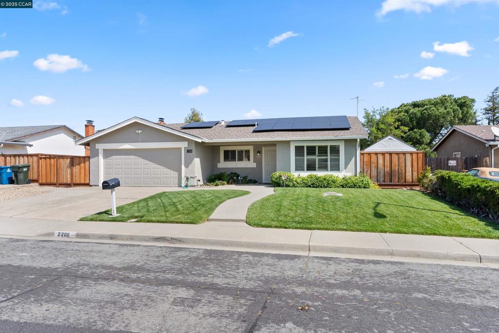 Stellar location close to Mira Vista Hills. Welcome to this charming 4 spacious bedrooms/2 baths 1595 sqft. single level house with a lush low maintenance frontyard and backyard. Artificial turf keeps green all year round. Covered stamped concrete patio offers filtered Sunshine. This beautiful backyard awaits you, your friends and family for summer BBQ's, outdoor games and Lemonade! Inside is just as spectacular! Separate living and family areas. Enough bedrooms to call one an office and another a guest room. Primary bedroom has 2 mirrored closets with organizers. Close the door off to the bedrooms for privacy is a great feature! Imagine cuddling up to a cozy fireplace with a good book. Plantation Shudders in Living Room, Family Room and Kitchen. Dual pane windows throughout and Solar powered. This home is comfortable, clean and waiting for you! Don't Delay ~ Call today!
