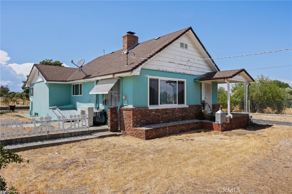 MAKE THIS YOUR DREAM RANCHETTE! Corner lot, 10 acres, completely fenced & gated with an adorable farmhouse with over 1,350 sq. ft., walk into your spacious living area w/fireplace to keep you cozy all winter long, mini split system for both AC/Heat, formal dining area, spacious kitchen, large bedrooms, and a full-size basement. New electrical, including panel & sub panel & all newer plumbing. So much potential, just needs a few updates to make this your home! Property also offers a large shop, ag well & an additional storage shed. Home sits at top of a hill with amazing sunrise & sunset views. PRICED TO SELL!