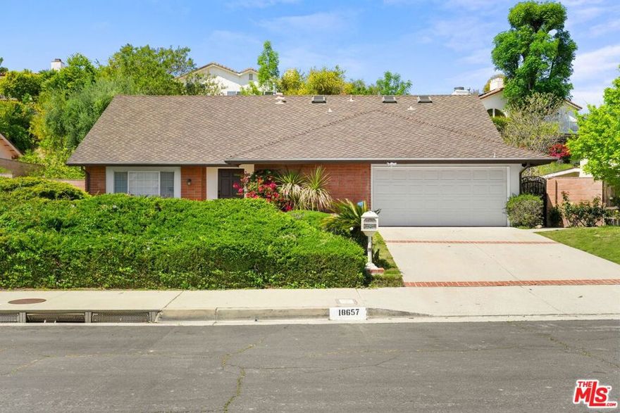 Step into this beautifully updated home, nestled in the highly coveted and charming neighborhood of Porter Ranch. Offering nearly 2,600 square feet of thoughtfully designed living space, this residence boasts an open floor plan that blends modern elegance with timeless appeal. The bright and airy living room is bathed in natural light, creating a warm and inviting atmosphere that seamlessly flows into the formal dining area perfect for both relaxing and entertaining. The spacious kitchen features an abundance of cabinetry and opens up to the family room, making it an ideal space for gatherings. With one bedroom conveniently located on the main floor, and additional bedrooms upstairs, this home provides ample space for the whole family. The oversized primary suite is a true retreat, overlooking the serene backyard and offering a peaceful escape at the end of the day. Don't miss out on this stunning, renovated home in a prime neighborhood. It's the perfect blend of comfort, style, and luxury, in a truly enviable setting.