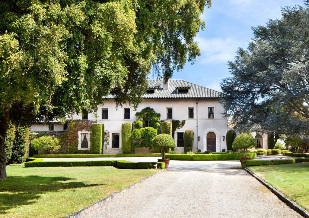The original life estate condition for the de Guigne family HAS BEEN REMOVED on this property ~ Rare & unique opportunity to buy one of the largest parcels of land on the San Francisco Peninsula ~ Approx. 47.4 acres midway between Silicon Valley & San Francisco, just 8 miles to SFO airport & private jet center ~ Over 100 year old mansion with Bay views, pool, hiking trails, canyons & reservoir ~ Ballroom, banquet dining, professional kitchen ~ Detached 3-car garage, 8-car carport, and tremendous motor court parking ~ Truly a landmark property with potential to subdivide.