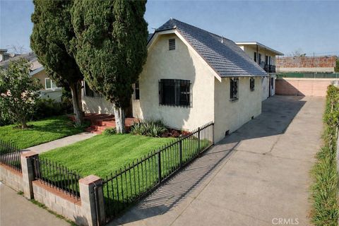 Photo of 1339 E Wesley Drive, Long Beach, CA 90806 (MLS # PW26069273)