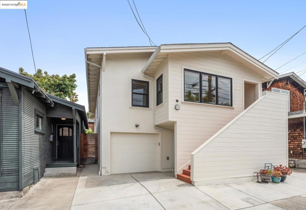 Fully vacant and located in the vibrant Longfellow neighborhood of North Oakland, this rare triplex offers three separate dwellings across two houses—just blocks from MacArthur BART, locally owned restaurants, cafés, and shops. It's the perfect “house-hack”: live in one unit and rent the others, or create a flexible multigenerational compound. The main white house at 676 was extensively renovated in 2018 with all-new systems including foundation, plumbing, electrical, and HVAC. The upper unit is a spacious 2-bedroom, 1.5-bath home, and the lower level is a separate 2-bedroom, 1-bath unit—both with modern kitchens, updated bathrooms, and in-unit laundry. Use them independently or combine them into one larger residence via the internal staircase. The detached 1-bedroom, 1-bath cottage at 678 offers even more flexibility—perfect for rental income, guests, or a dedicated home office. Set among mature, drought-tolerant landscaping, this turnkey property delivers comfort, versatility, and location in one of Oakland’s most exciting neighborhoods.
