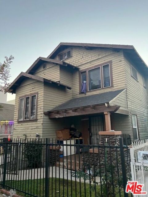 Photo of 4911 S Normandie Avenue, Los Angeles, CA 90037 (MLS # 25628521)