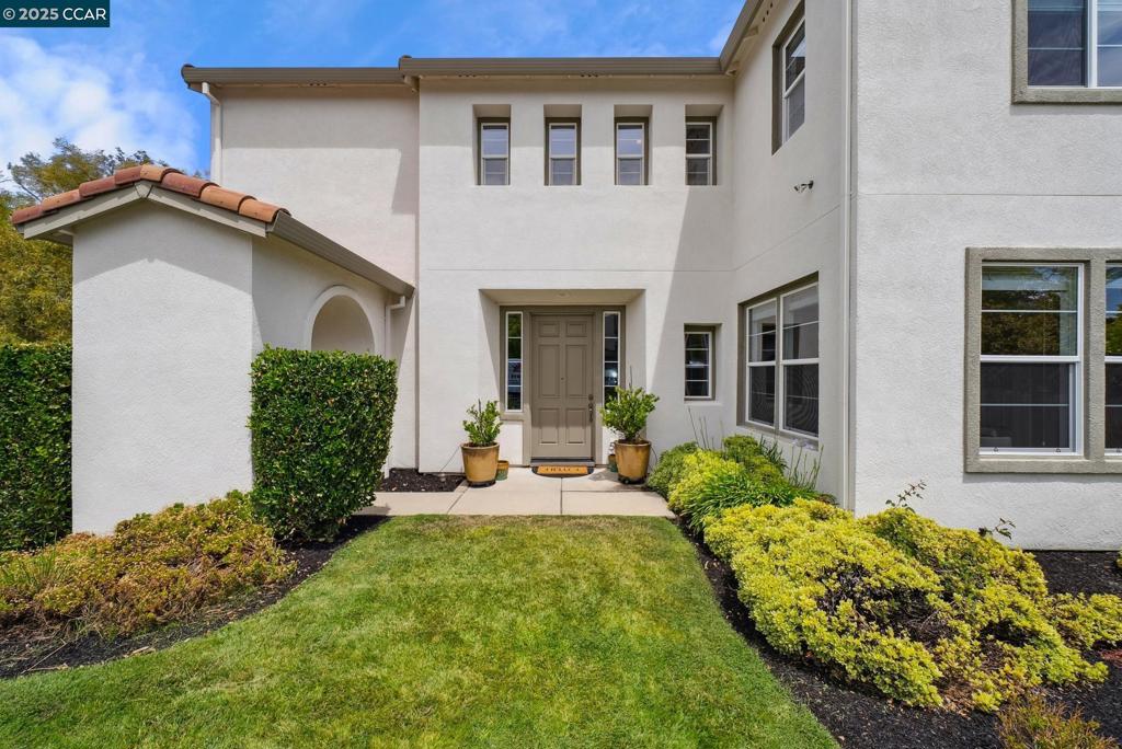 Look at this price!!! Welcome to this gorgeous, move-in ready home in one of Concord’s most desirable gated neighborhoods—Montecito, located just minutes from Walnut Creek! This expansive residence offers 5 spacious bedrooms, 4.5 baths, and a thoughtfully designed layout ideal for modern living. The heart of the home is the chef’s kitchen, featuring a massive center island with seating, double ovens, and breakfast nook—perfectly positioned to overlook the inviting family room. The first floor offers incredible versatility with a formal dining room, living room, an ensuite bedroom, and a large bonus room ideal for guests, in-laws, an office, or a playroom. Upstairs, discover four additional bedrooms, including a luxurious primary suite with double-door entry and a spa-like bath retreat. Enjoy indoor-outdoor living in the beautifully landscaped backyard with lush lawn and stamped concrete patio—perfect for relaxing, entertaining, or dining under the stars. Located near top-rated schools, BART, and premier shopping like Whole Foods, Trader Joe’s, and Safeway—with access to nearby hiking and biking trails. Montecito offers fantastic community amenities including a pool, spa, and playground.This home has it all, space, style, community and convenience