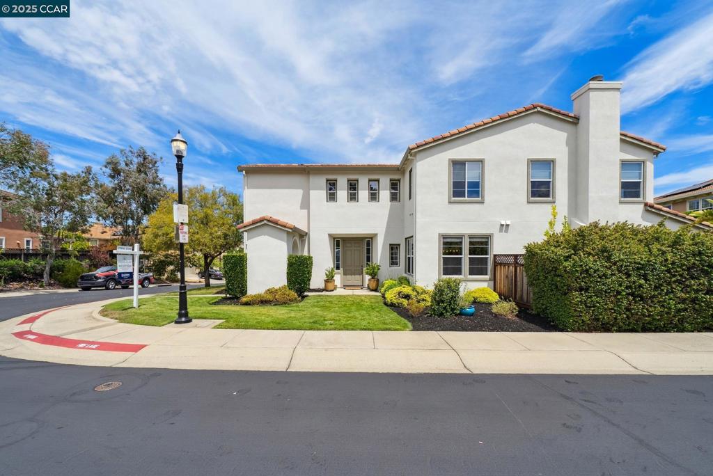 GORGEOUS 5 bed, 4.5 bath home in the desirable gated Montecito neighborhood! The stunning kitchen features a huge center island with seating for four, double ovens, breakfast nook, and overlooks the spacious family room—perfect for entertaining. Downstairs offers a formal dining room, living room, ENSUITE BEDROOM, and a versatile BONUS ROOM, ideal for guests, au pair, in-laws, play room or office!. Upstairs you'll find four more spacious bedrooms, including a luxurious primary suite with double-door entry and a spa-like bathroom. The backyard features a lush lawn and stamped concrete patio—ideal for relaxing or outdoor dining. Unbeatable value and prime location—bordering Walnut Creek with easy access to BART, schools, shopping like Whole Foods, Safeway, Trader Joes. Awesome proximity to hiking, walking, biking trails! Montecito also features awesome community pool, spa and playground! THIS IS IT!