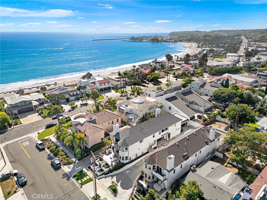 Experience coastal living at its finest in this fully remodeled Capistrano Beach home. Completed in 2025, Unit A offers three spacious bedrooms and three modern bathrooms across two beautifully designed levels.
The main floor features an open living area with a cozy fireplace and peek-a-boo ocean views, perfect for relaxing or entertaining. The chef’s kitchen showcases quartz countertops, stainless steel appliances, a pot filler, and a walk-in pantry with a wine cooler. A full bathroom and dedicated laundry room with sink and side-by-side washer/dryer add everyday convenience.
Upstairs, the primary suite feels like a private retreat with a balcony capturing ocean breezes, a spa-inspired bath with soaking tub, frameless rain shower, and dual vanity. Two additional bedrooms with mirrored closets share a stylish full bath—ideal for family, guests, or office use.
Additional highlights include smart-home features, remote-controlled HVAC, tankless water heater, and an attached two-car garage. Minutes from Dana Point Harbor, beaches, and local dining, this home blends modern comfort with coastal charm.