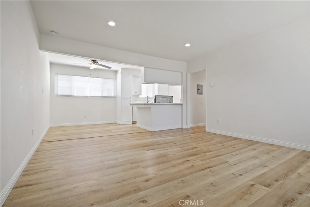 This stunning 2-bedroom, 1.5-bathroom apartment offers the perfect blend of modern upgrades and an unbeatable North Redondo Beach location. Step inside to discover a bright and airy living space featuring stylish vinyl flooring and contemporary recessed lighting. The heart of the home is the completely remodeled kitchen, which boasts brand new shaker-style cabinets, sleek new quartz countertops, and a new stove, creating a perfect space for any home chef. Both bathrooms have been recently updated with modern fixtures and finishes. Enjoy the ultimate convenience with a major grocery store and shopping center located directly across the street. Best of all, you are just a short stroll or bike ride away from the sun, sand, and surf of Redondo Beach and the Pier. Don't miss this rare opportunity to live the quintessential Southern California beach lifestyle. This beautifully updated apartment won't last long. Schedule your showing today!