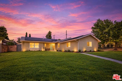 Photo of 18515 Chatsworth Street, Porter Ranch, CA 91326 (MLS # 26998031)