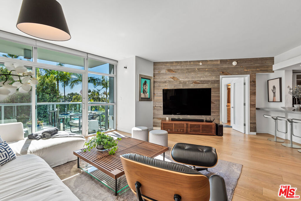 **Offered furnished or unfurnished** Masterfully renovated 3-bedroom, 3.5-bathroom unit with an additional den/office overlooking the pool in the full-service, high-rise Azzurra. The unit boasts fabulous marina views, tons of natural light, an open floor plan, gorgeous wood floors throughout, 9 foot floor-to-ceiling glass, and two balconies. The chef's kitchen features a breakfast bar, quartz countertops, stainless-steel appliances and a large wine fridge. The primary suite includes an en-suite, spa-like bathroom with a dual vanity, separate shower and tub, and an expansive walk-in closet. The unit also includes a powder room, central air/heat, in-unit laundry and 2 parking spaces. Rent include cable w/HD channels, internet, water, trash and an abundance of resort-style amenities -24 hour valet parking for guests, 24 hour front desk & security, concierge, rooftop spa & sky-lounge w/panoramic views, outdoor kitchen with BBQ's, sparkling heated pool & spa, business center, media lounge, fine art collection, indoor/outdoor professional fitness center w/yoga/pilates training studio, & more. Just seconds from world famous beaches, Marina access, LAX, parks, bike path, dog walk, Abbott Kinney, shops/restaurants & dine-in movie theater and much more!