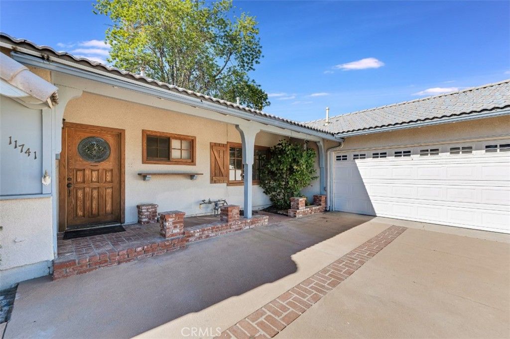 Photo of 11741 Odessa Avenue, Granada Hills, CA 91344 (MLS # SR25259203)