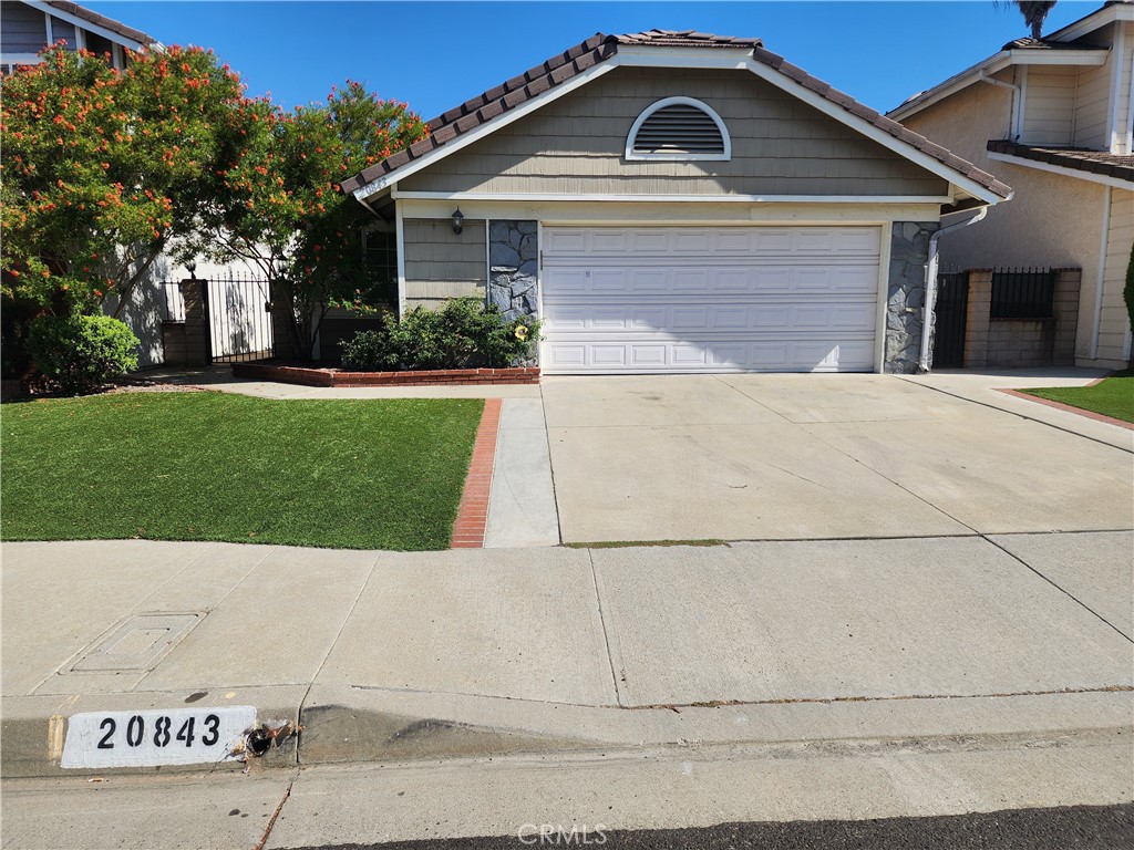 This 3-bedroom, 2-bathroom and 2 car attached garage Home is now available. Wood flooring throughout and carpet in 2 bedrooms. Kitchen has granite counter tops, and includes stove-top/oven, microwave, refrigerator and dishwasher appliances. Living room features decorative fireplace. The primary bedroom has 2 closets and private bathroom with dual sinks. The other 2 bedrooms are very spacious and offer plenty of closet storage space. Washer and dryer connections are located in the garage. Low maintenance backyard has a covered patio area. This property is located near the 57 & 60 freeway, restaurants, grocery stores and many shopping plazas.