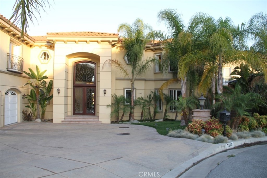 Luxury Home on top of Pasadena hills. The Gated Community of Kinneloa Ridge. Mediterranean Villa with over 6100 sq/ft feet of high class living. 6 bedroom and 6.5 bath. High cathedral ceiling, Grand dining room and a majestic Living. A beautiful entry foyer with a rod iron stairway leading to the Master Bedroom upstairs. Each room has a wonderful feel of the city and a corner ocean view. family room has customized wooden floor while the rest of the house is in Travertine stone. Take a swim in the luxury infinities pool overseeing the city view. Owner will pay for gardening and pool services. Visualized yourself in this grand house. Live in a mansion and enjoy the spectacular view. House is partial furnish with Washer& Dryer, Built in Refrigerator, Most of the Bedroom are fully furnish with Bed & Dresser. Family Room and Living room has sofa and table. Complete entertainment center includes Sony television. Owner will consider removing the furniture upon request.