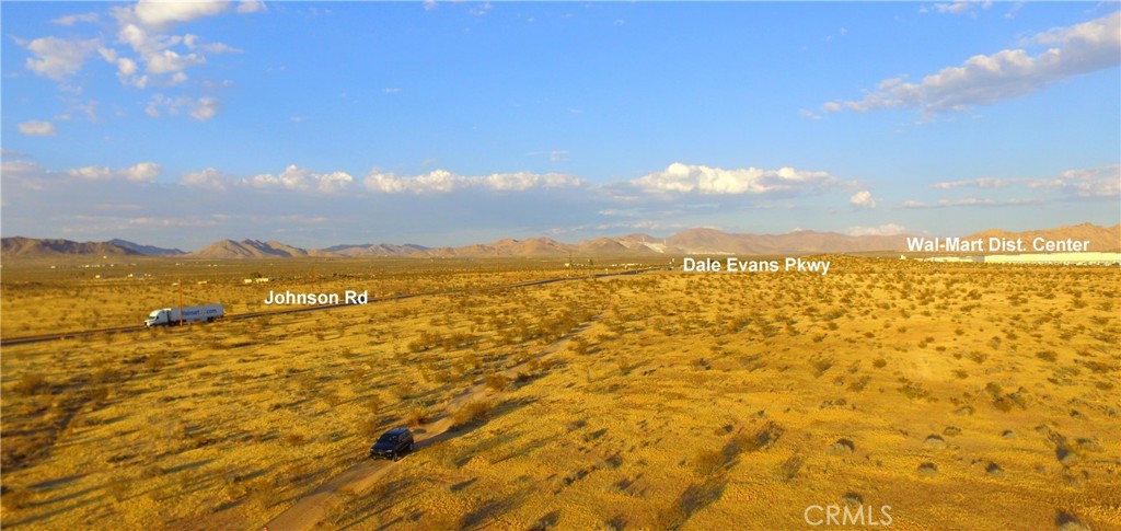 ***Come VIEW and MAKE an OFFER today! Amazing LAND OPPORTUNITY located in expanding Apple Valley CA. The 2.5 ACRE parcel is zoned (RM) Residential Multi-Family allowing for 2 to 20 units per net acre. Situated just SW of high traffic intersection at Dale Evans Pkwy and Johnson Rd the parcel is directly in the path of GROWTH. Also, the lot is only a few miles east of the INTERSTATE-15 and Stoddard Wells Rd underpass, allowing for excellent access to all of Southern CA. The surrounding area is seeing increased demand with companies like Wal-Mart and Big Lots developing distribution centers nearby. Not to mention, the BRIGHTLINE WEST HIGH-SPEED RAIL SYSTEM is coming to the area. Four rail stations have been proposed for the Victor Valley region with one station located in Apple Valley just off the Dale Evans Pkwy and 15-Freeway Exit, only a few miles away from this parcel. According to Brightline Press release on 12/8/23 elected Officials from Nevada and California formally announced that the high-speed rail project has received 3 BILLION in funding. With so much potential for growth and expansion, this a must see opportunity before it's too late.***