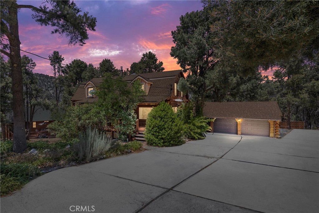 Come home to your spectacular authentic log cabin in Pine Mountain Club, the idyllic setting in the mountains of the Los Padres National Forest. Whether it’s a roomy full-time family home or a stunning vacation and income generating property you seek, this one is sure to over-deliver. Lots of recent refurbishments and upgrades, including flooring, roof, lighting, skylights, water heater etc., plus central heat AND A/C. Enter on the main level from the covered front deck, into a spacious living room with a toasty propane stove, modern upgraded kitchen with center island, all appliances and a large walk-in pantry. Also on this level is a large dining room, mud room, bathroom and additional redwood deck out back.
Upstairs has three roomy bedrooms, with the large master featuring additional space and a wood burning stove. A full bathroom is located on this level.
Go downstairs from the main level to a large area that’s not included in the listed square footage, which includes another family area, laundry area, wood burning stove, and plenty of additional space with easily accessible plumbing limited to only your imagination.
The huge, oversized garage with workshop, plus numerous parking spaces (that is also set-up for an RV) on this large and usable lot tops off this immaculate home.
Pine Mountain Club is a wonderful amenity-filled treasure, featuring a fun local village with great eateries, hiking trails with waterfalls, a Clubhouse where you can soak in our brand-new resort-style pool, play tennis, pickle ball, golf, relax in the restaurant & lounge and enjoy other fun activities. Pine Mountain Club is a four-season mountain community, surrounded by 1.7 million acres of National Forest, less than an hour away from Santa Clarita and Bakersfield. Don’t miss out and call today for your private showing.