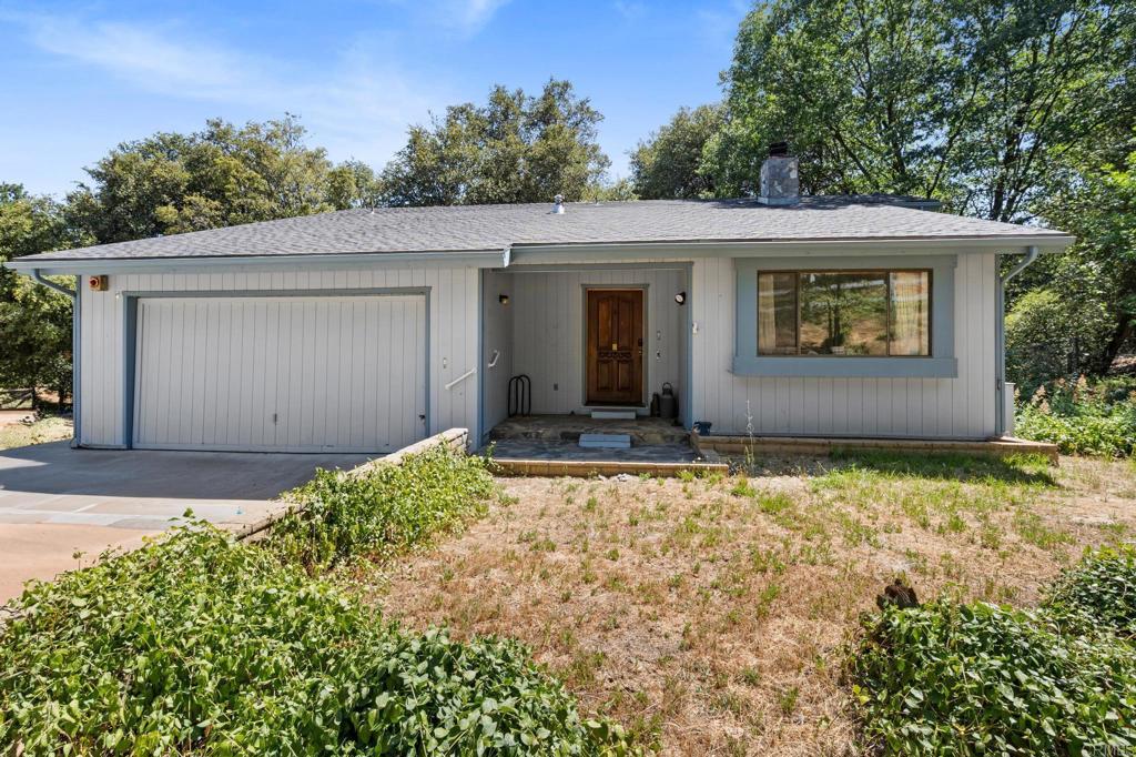 Discover your very own sanctuary in the heart of Julian! This captivating 3-bedroom, 2-bathroom ranch-style home, boasting 2198 sq ft, is perfectly situated on a sprawling 1+ acre lot, offering an authentic taste of mountain living. Step inside and be greeted by a warm and inviting "cabin on a mountain" vibe, with rustic touches that create a cozy and serene atmosphere. Imagine crisp Julian evenings by a crackling fire, enjoying the tranquility of your private retreat. While this home is ready for your personal touch and a bit of TLC, it comes with essential modern upgrades for comfort and peace of mind. A whole-home generator ensures uninterrupted power, no matter the weather, and an on-demand tankless water heater provides endless hot water for those relaxing post-hike showers. The expansive, private lot is a true gem, offering ample space for gardening, outdoor entertaining, or simply enjoying the crisp mountain air and starry nights. Embrace the changing seasons of Julian, from vibrant fall colors to occasional winter snow, all from the comfort of your own piece of paradise. Located in a desirable Julian neighborhood, you'll relish the peace and quiet of rural living while still being a short drive from charming Main Street, renowned for its famous apple pies, historic gold mines, unique shops, and delightful community events. Explore nearby hiking trails, wineries, and the natural beauty that makes Julian so special. This is more than just a home; it's an opportunity to live the idyllic Julian lifestyle you've dreamed of. Don't miss your chance to cultivate your vision in this unique mountain gem!