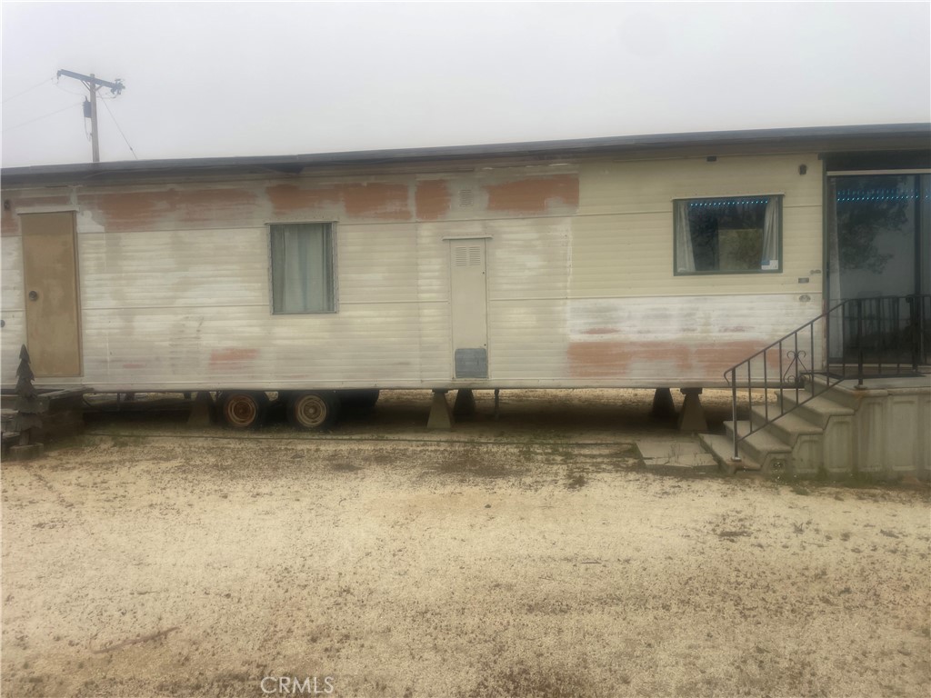 Land with ELECTRIC , WATER, and a 1971 mobil HOME on paved Burnt Valley. This property has a lot to offer on the nearly 4 acres of land.
You will be able to drive your car right up to the house and still feel like you got away from it all. This land has a storage unit that will remain on the property as well.
