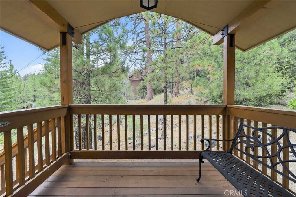 Welcome to your dream retreat in the heart of Pine Mountain Club! Nestled among towering pines, this beautifully maintained mountain home offers the perfect balance of rustic charm and modern upgrades. Whether you're looking for a full-time residence, a vacation getaway, or an income-generating rental, this property delivers.
Once inside and be greeted by warm wood accents, vaulted ceilings, and a cozy fireplace — ideal for snowy winter nights. The spacious open-concept living area flows seamlessly into a well-equipped kitchen and dining space, perfect for entertaining family and friends. Large windows throughout invite in natural light and offer stunning forest views.
This home features 2 bedrooms and 2 baths, including a private master suite with serene treetop views. Enjoy year-round outdoor living with expansive decks, a peaceful backyard, and easy access to hiking trails, the village center, and community amenities like the clubhouse, pool, golf course, and more.
Whether you're sipping coffee on the deck or stargazing at night, 15028 Chestnut Drive offers the tranquility and beauty of mountain living just 90 minutes from Los Angeles.