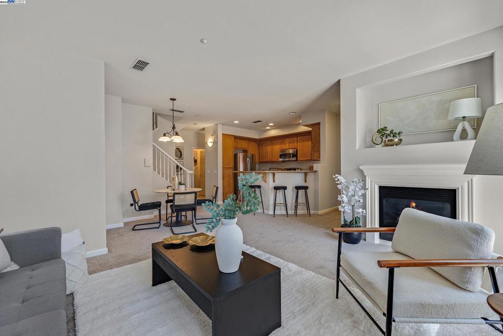 More Space. More Light. More Lifestyle. Welcome to a rare 3-bedroom, 1,897 sqft condominium in Dublin Ranch—where morning sunlight pours in, every room feels open, and you’re just steps from parks, trails, and resort-style amenities. Step inside to soaring ceilings, BRAND NEW CARPET AND PAINT, and a chef’s kitchen with granite counters, stainless appliances, and an entertainer’s island that flows into a sunlit living space. Cozy up by the fireplace, host dinner on your private balcony, or retreat to the oversized primary suite with spa-like bath and walk-in closet. Upstairs laundry, a tandem 2-car garage, and abundant storage make daily living effortless. Community perks include a sparkling pool, spa, fitness center, clubhouse, and beautifully maintained grounds—all with low HOA dues. Located minutes from top-rated schools, shopping at Fallon Gateway, and easy freeway/BART access for commuters. This isn’t just a home—it’s the upgrade you’ve been waiting for. Come see why three bedrooms in Dublin Ranch sell fast… before this one’s gone.