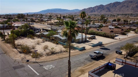 Photo of 703 Sunnyslope Drive, 29 Palms, CA 92277 (MLS # HD26119032)