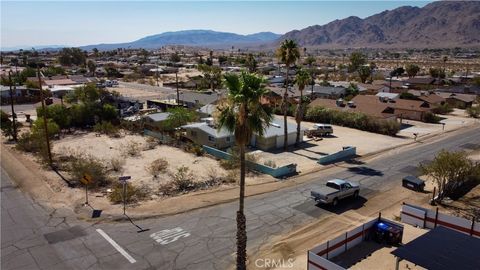 Photo of 703 Sunnyslope Drive, 29 Palms, CA 92277 (MLS # HD26119032)